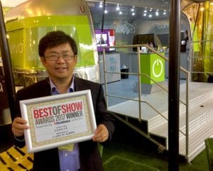 Conviva Team Member Proudly Holding The TVTechGlobal Award for Best of Show Awards 2017