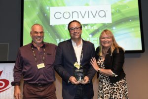 Oliver Receiving An Award For Conviva'S Video AI Alerts