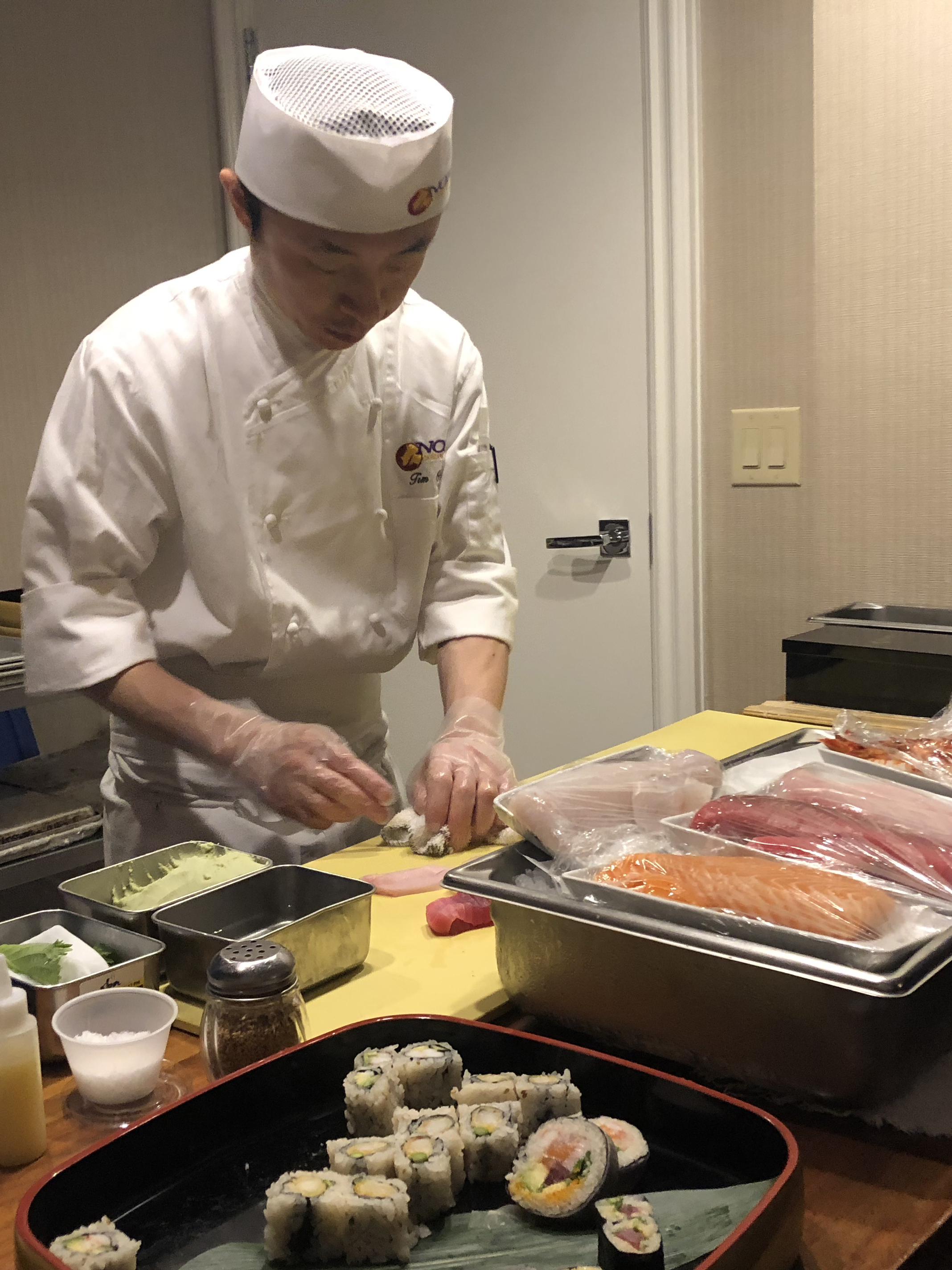 Sushi Chef Preparing Fresh And Delightful Sushi For Conviva's Employee Joining Ces