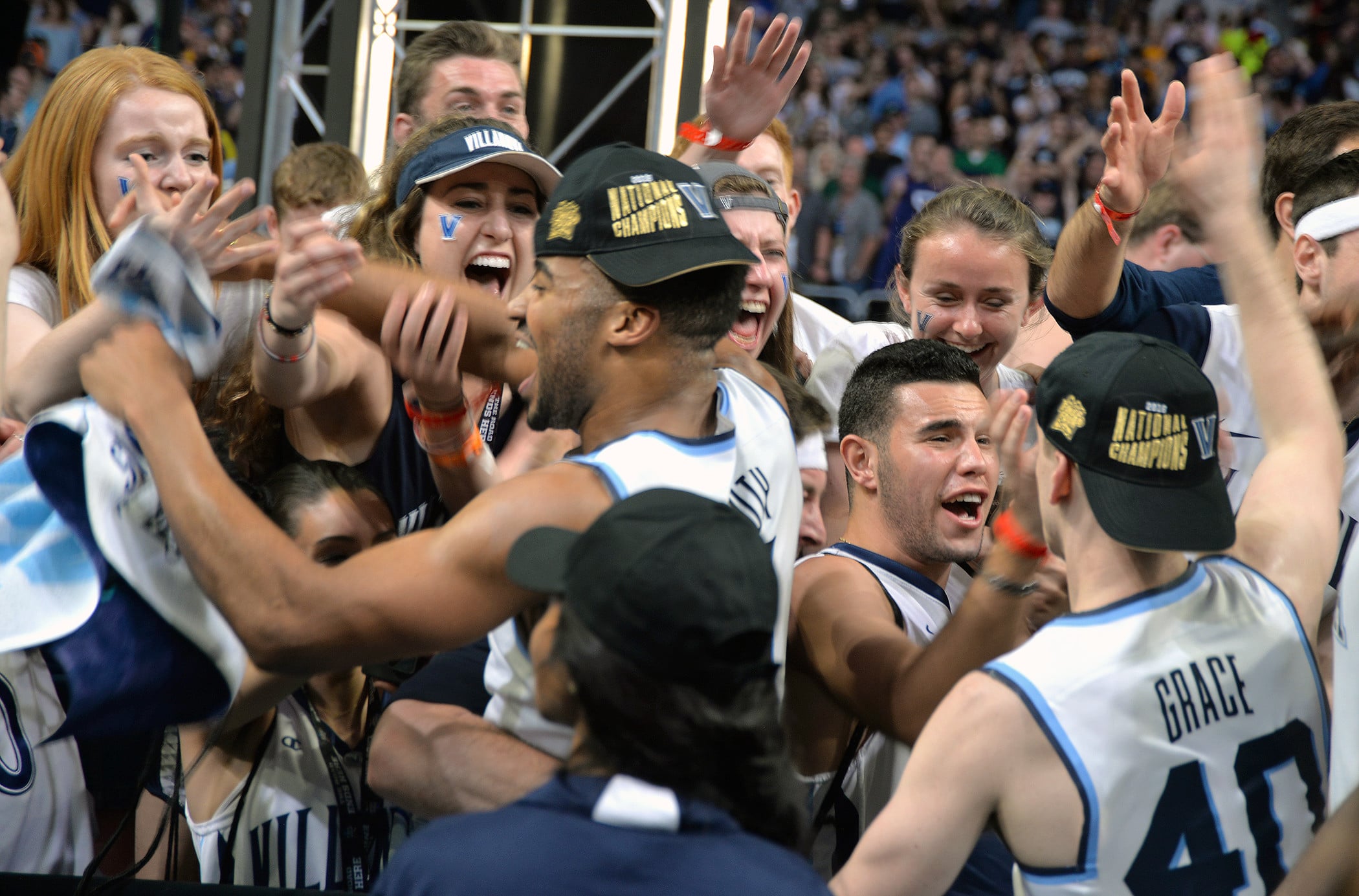 Players At March Hoops Happily Hugs Fans To Celebrates It'S Win